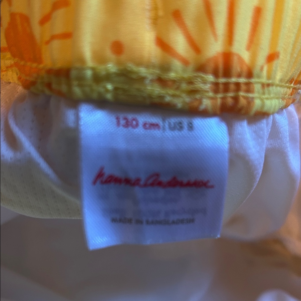 Hanna Andersson Yellow Sun Print & Teal Colorblock Kids Swim Trunks - Picture 4 of 7